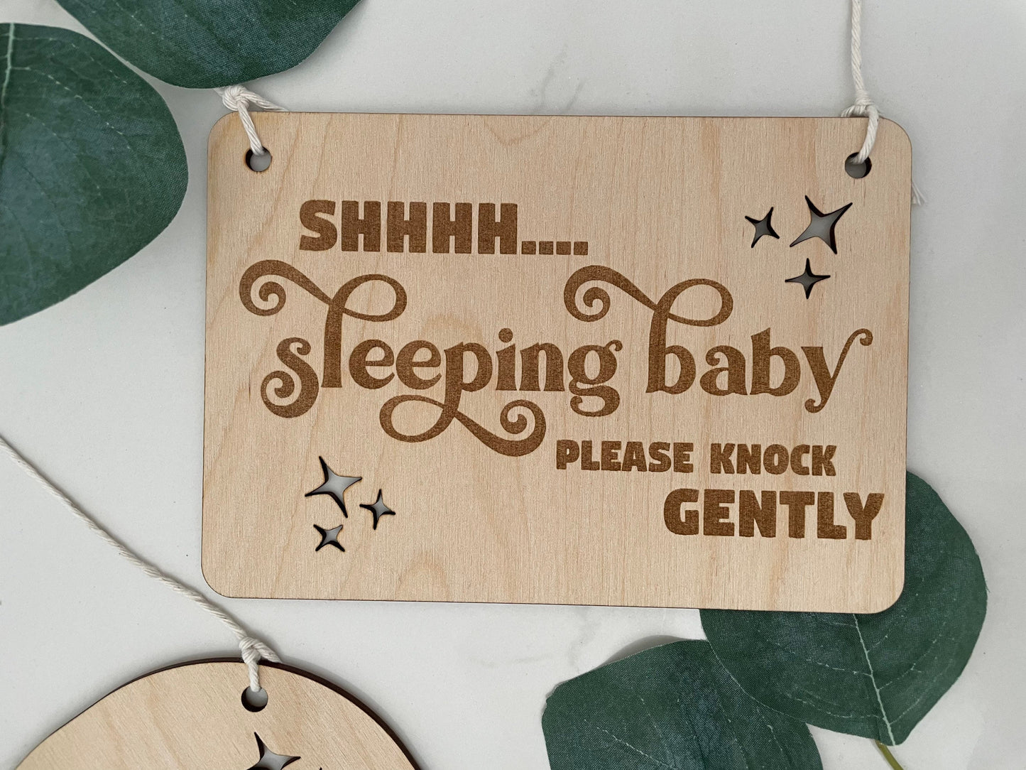 Baby sleeping knock gently sign