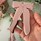 bow coquette laser cut digital design, long ribbon bow, modern bow ornament svg file, very cutesy demure trending bow 2024