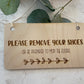 Remove your shoes doorbell sign
