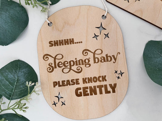 Baby sleeping knock gently sign