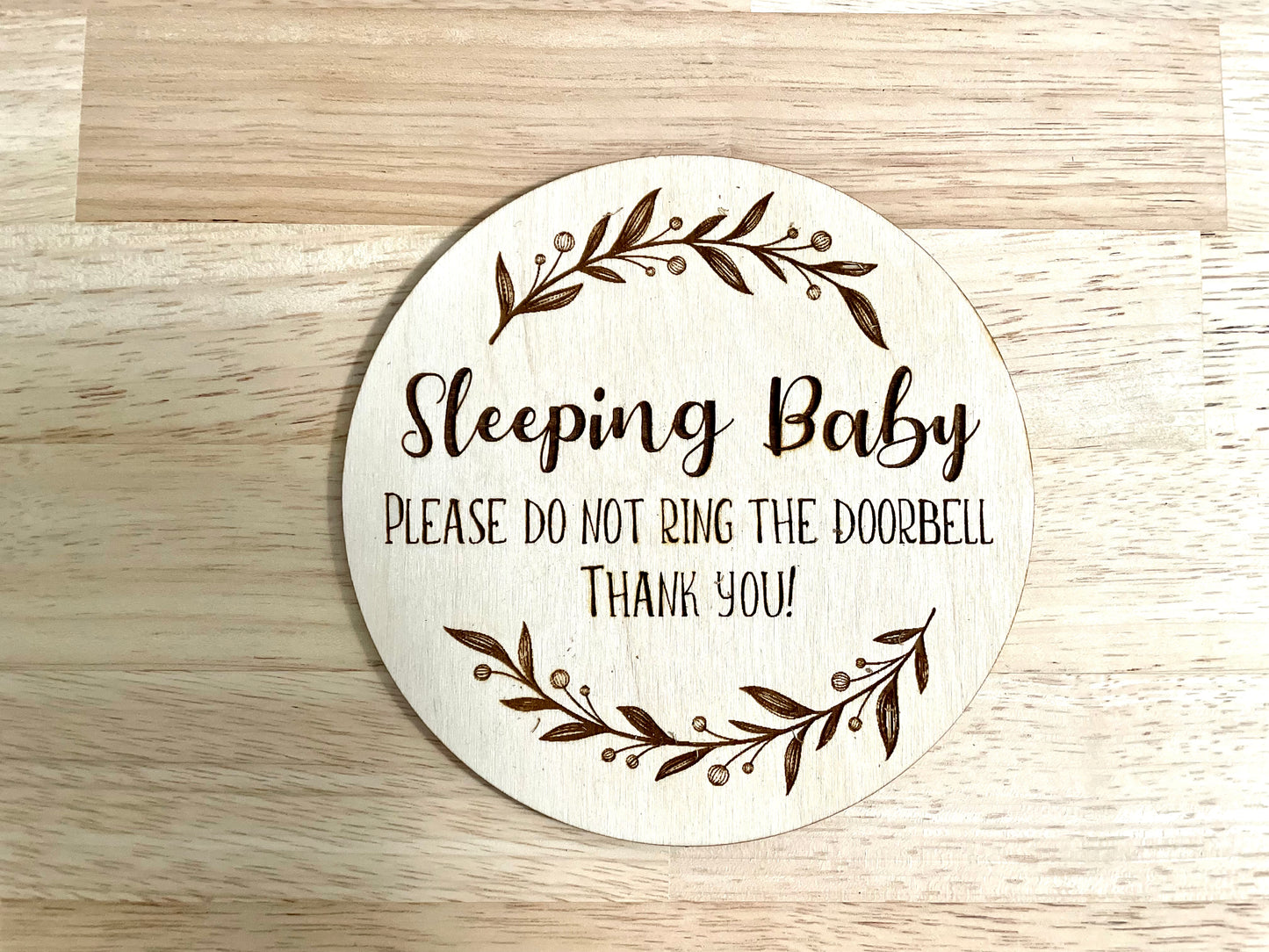 Round sleeping baby sign